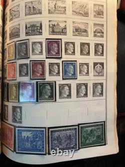 Imposante collection de plus de 7 000 timbres du monde entier, neufs et oblitérés, dans un album Citation