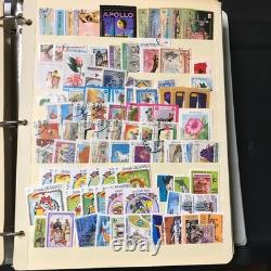 Livre de stock de timbres, environ plus de 3600 timbres de 90 pays, neufs et oblitérés