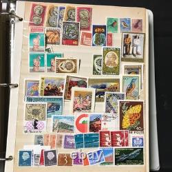 Livre de stock de timbres, environ plus de 3600 timbres de 90 pays, neufs et oblitérés