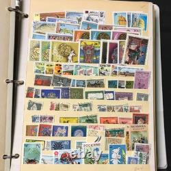 Livre de stock de timbres, environ plus de 3600 timbres de 90 pays, neufs et oblitérés