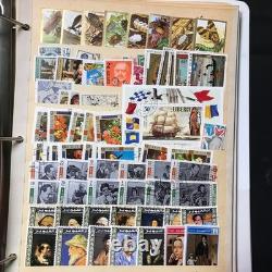 Livre de stock de timbres, environ plus de 3600 timbres de 90 pays, neufs et oblitérés