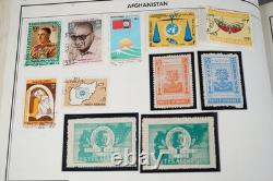 MONDE 1850-1970 COLLECTION A-C DE PLUS DE 6150 TIMBRES NEUFS ET USAGÉS DANS UN ALBUM HARRIS