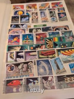 Magnifique collection de timbres des États-Unis et du monde entier dans un album parfait. Regardez / Voir