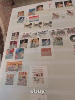 Magnifique collection de timbres des États-Unis et du monde entier dans un album parfait. Regardez / Voir