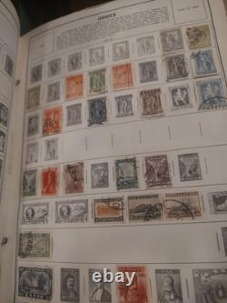 Magnifique et importante collection de timbres du monde entier dans un énorme album He Harris. $$$