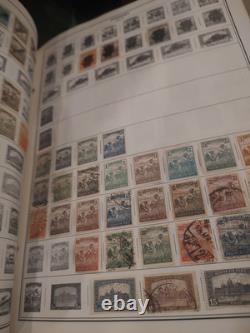 Magnifique et importante collection de timbres du monde entier dans un énorme album He Harris. $$$