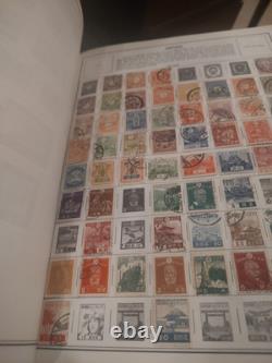 Magnifique et importante collection de timbres du monde entier dans un énorme album He Harris. $$$