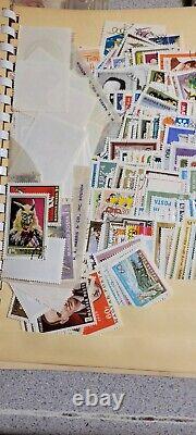 Milliers de timbres postaux européens et américains, tous anciens avec certains datant de