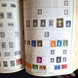 Minkus Pub L'album mondial de timbres The Master 1847-1957 avec des tonnes de timbres
