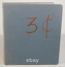Notre accumulation de plus de 2 500 timbres neufs et oblitérés, stockés dans un classeur sur des pages de stock.