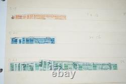 Notre accumulation de plus de 2 500 timbres neufs et oblitérés, stockés dans un classeur sur des pages de stock.