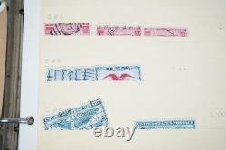 Notre accumulation de plus de 2 500 timbres neufs et oblitérés, stockés dans un classeur sur des pages de stock.