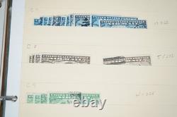 Notre accumulation de plus de 2 500 timbres neufs et oblitérés, stockés dans un classeur sur des pages de stock.