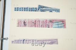 Notre accumulation de plus de 2 500 timbres neufs et oblitérés, stockés dans un classeur sur des pages de stock.