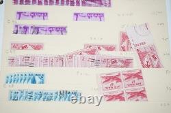Notre accumulation de plus de 2 500 timbres neufs et oblitérés, stockés dans un classeur sur des pages de stock.