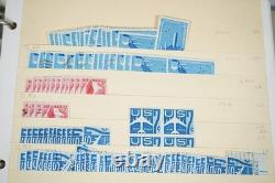 Notre accumulation de plus de 2 500 timbres neufs et oblitérés, stockés dans un classeur sur des pages de stock.