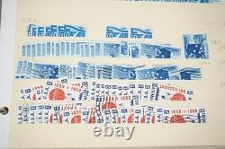 Notre accumulation de plus de 2 500 timbres neufs et oblitérés, stockés dans un classeur sur des pages de stock.