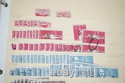 Notre accumulation de plus de 2 500 timbres neufs et oblitérés, stockés dans un classeur sur des pages de stock.
