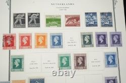 PAYS-BAS 1850-1940 COLLECTION DE 600+ TIMBRES NEUFS ET USAGÉS DANS UN ALBUM SCOTT