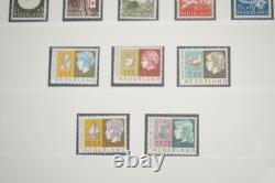PAYS-BAS 1940-1970 COLLECTION DE PLUS DE 550 TIMBRES TOUS NEUFS DANS UN ALBUM LIGHTHOUSE