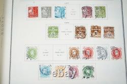 SCANDINAVIE 1870-1970 COLLECTION DE PLUS DE 1300 TIMBRES NEUFS ET USAGÉS DANS UN ALBUM SCOTT