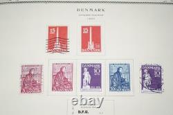 SCANDINAVIE 1870-1970 COLLECTION DE PLUS DE 1300 TIMBRES NEUFS ET USAGÉS DANS UN ALBUM SCOTT