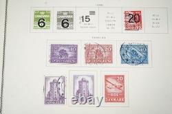 SCANDINAVIE 1870-1970 COLLECTION DE PLUS DE 1300 TIMBRES NEUFS ET USAGÉS DANS UN ALBUM SCOTT