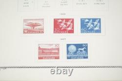 SCANDINAVIE 1870-1970 COLLECTION DE PLUS DE 1300 TIMBRES NEUFS ET USAGÉS DANS UN ALBUM SCOTT