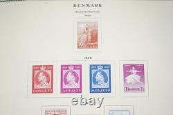 SCANDINAVIE 1870-1970 COLLECTION DE PLUS DE 1300 TIMBRES NEUFS ET USAGÉS DANS UN ALBUM SCOTT