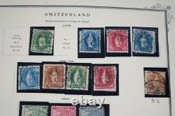 SUIISSE 1860-1970 COLLECTION DE PLUS DE 1 000 TIMBRES CONSERVÉS DANS UN ALBUM SCOTT