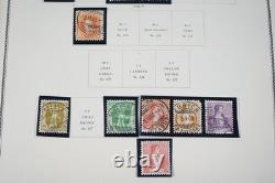 SUIISSE 1860-1970 COLLECTION DE PLUS DE 1 000 TIMBRES CONSERVÉS DANS UN ALBUM SCOTT