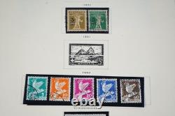 SUIISSE 1860-1970 COLLECTION DE PLUS DE 1 000 TIMBRES CONSERVÉS DANS UN ALBUM SCOTT