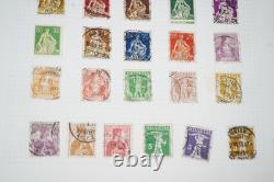 Suisse : collection de plus de 1 250 timbres usagés conservés dans un album
