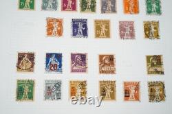 Suisse : collection de plus de 1 250 timbres usagés conservés dans un album