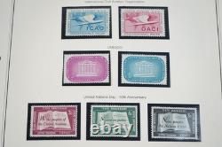 UNE COLLECTION DE TIMBRES DES ANNÉES 1950 À 1980 DE 800 TIMBRES ET 40 FEUILLES TOUS NEUFS DANS UN ALBUM MYSTIQUE