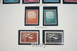 UNE COLLECTION DE TIMBRES DES ANNÉES 1950 À 1980 DE 800 TIMBRES ET 40 FEUILLES TOUS NEUFS DANS UN ALBUM MYSTIQUE