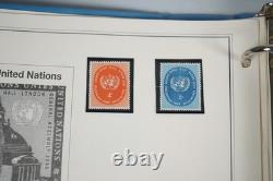 UNE COLLECTION DE TIMBRES DES ANNÉES 1950 À 1980 DE 800 TIMBRES ET 40 FEUILLES TOUS NEUFS DANS UN ALBUM MYSTIQUE