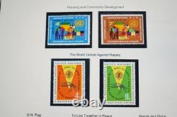 UNE COLLECTION DE TIMBRES DES ANNÉES 1950 À 1980 DE 800 TIMBRES ET 40 FEUILLES TOUS NEUFS DANS UN ALBUM MYSTIQUE
