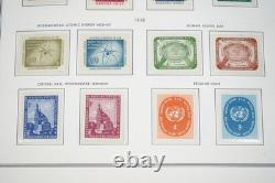 UNE COLLECTION DE TIMBRES DES ANNÉES 1950 À 1990 DE PLUS DE 500 TIMBRES TOUS NEUFS STOCKÉS DANS UN ALBUM HARRIS