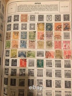 Un classeur à couverture rigide de la collection de timbres du monde standard H E Harris, album J-Z.