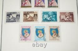 Vatican 1929-1981 Collection de 575 timbres neufs et utilisés dans un album Scott