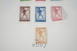 Yougoslavie 1918-1957 Collection de 625+ timbres neufs et utilisés dans un album Scott